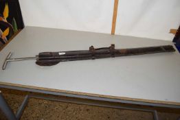 A leather cased spear end auger