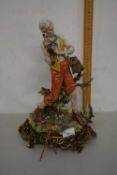 An Italian porcelain model of a fisherman