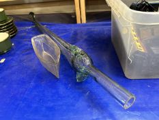 A large glass fish shaped bottle and a further boat shaped bowl