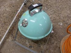 Small circular barbecue on stand