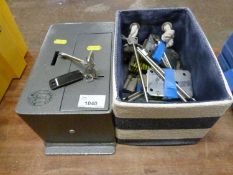 A small Burton wall safe together with a box of various locks