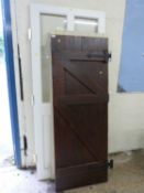 A group of three wooden doors