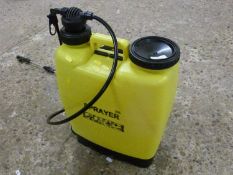 A backpack weed sprayer