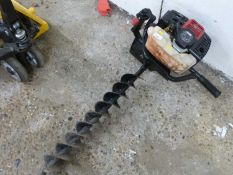 A Rockworth petrol auger drill