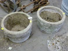 A pair of vintage circular concrete planters