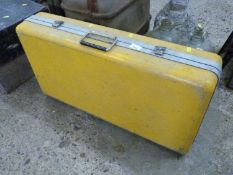 A yellow instrument case