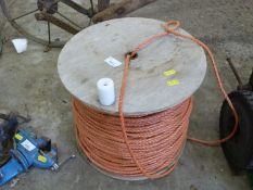 A reel of orange rope