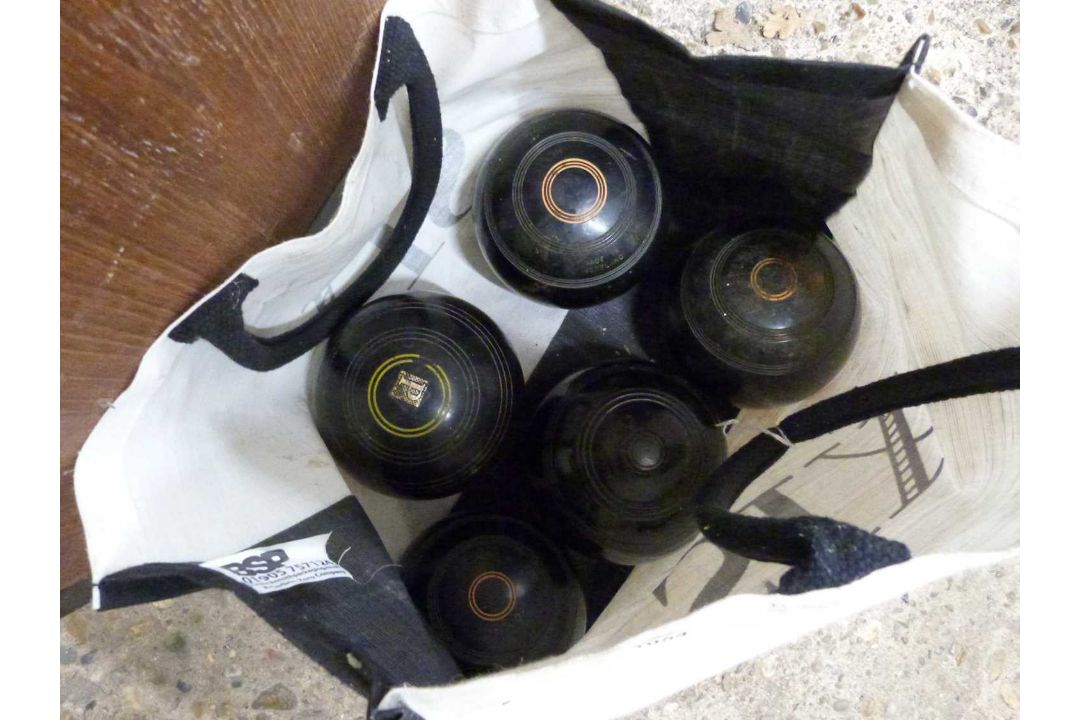 Group of five lawn bowls