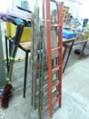 Two vintage stepladders and a further red wooden ladder (3)