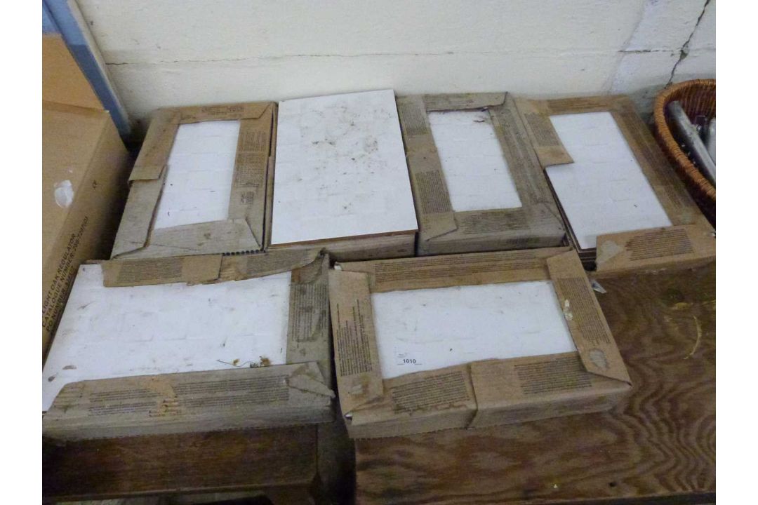 Five boxes of Alexandria 25 x 40 white deco tiles