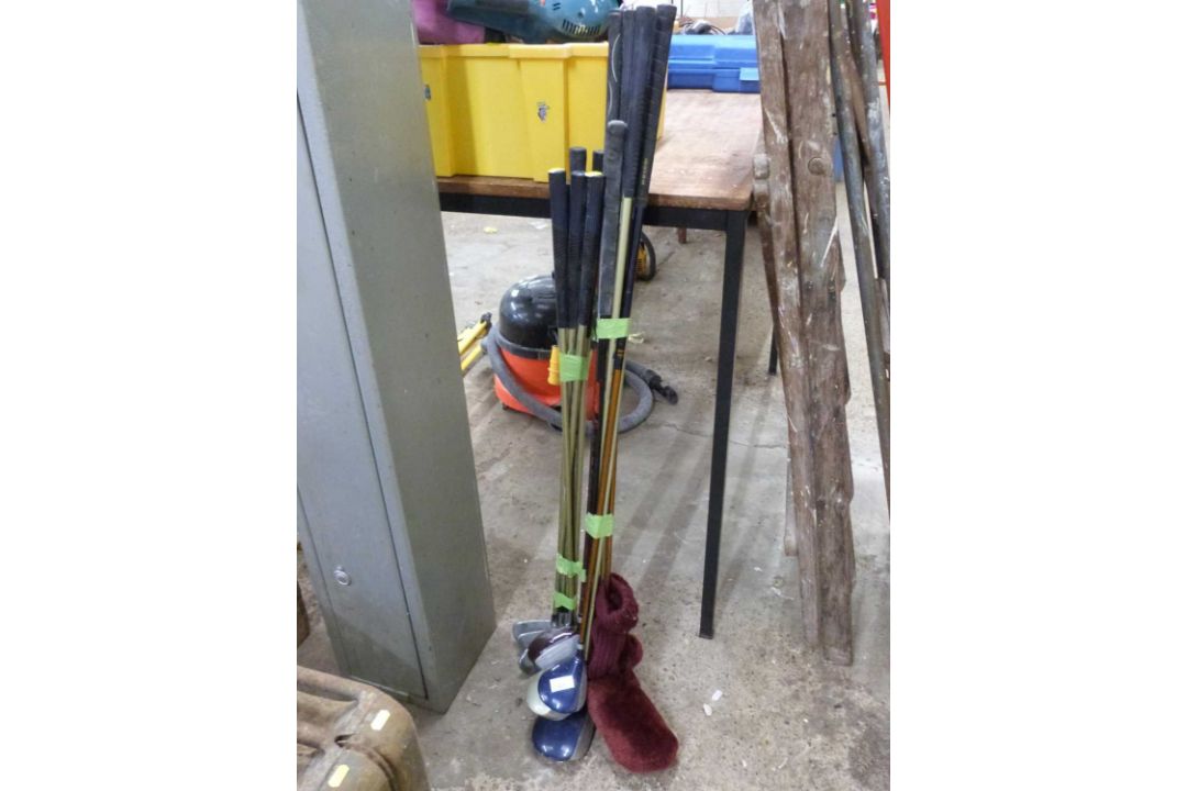 A quantity of golf clubs mainly Howson
