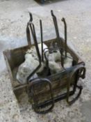 Box of concrete garden ornaments together with a folding boot scraper