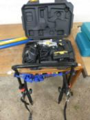 A McAlister nail gun together with a folding bike rack