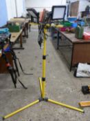 A double spotlight on tripod base