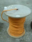 A reel of orange rope