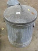 A galvanised dustbin