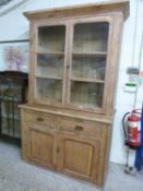 Victorian pine dresser with moulded cornice, glazed top section and a base with two drawers and