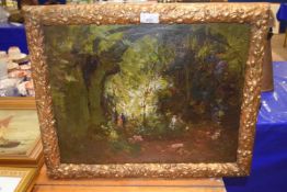 20th Century oil on hardwood panel, figures in a woodland setting, set in an oak leaf and acorn gilt