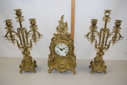 An Imperial gilt brass clock garniture of architectural form