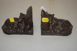 Pair of bronzed resin bookends formed as sleeping dogs