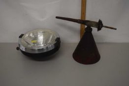 A Rallye 2000 head lamp together with a Redex fuel additive dispenser