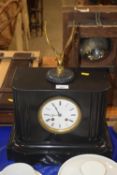 Victorian black slate cased mantel clock with eagle mount