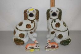 A pair of Staffordshire lustre finish Spaniels and a pair of small greyhound models