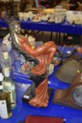 20th Century hollow bronzed metal and coloured model of a reclining lady