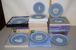 A collection of Wedgwood blue Jasper Christmas plates and others in original boxes