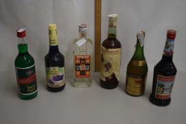 Group of six bottles of various liqueurs and spirits