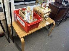 Childs desk together with a box of toys and a further multi toy box