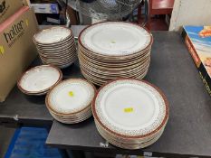 Quantity of gilt rimmed dinner wares
