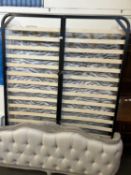 An Upholstered and buttoned limed oak double bed and matress (not checked )