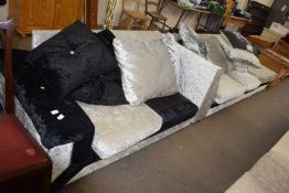 Two, two seater sofas and a matching foot stool