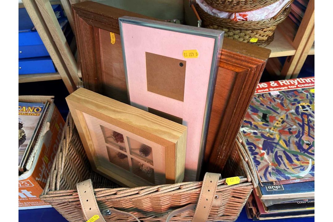 Wicker hamper and qty of picture frames