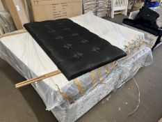 A double bed and black and diamonte studded head board (not checked)