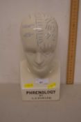 A reproduction Fowler Phrenology porcelain head