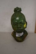 An East African carved verdite bust of a young woman