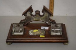 An oak and silver plated mounted desk stand