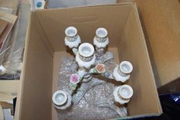 Continental porcelain four branch candelabra and a matching pair of candlesticks