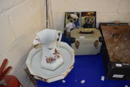 Two boxed Meercat figures, wash bowl and jug and a miniature cased sewing machine
