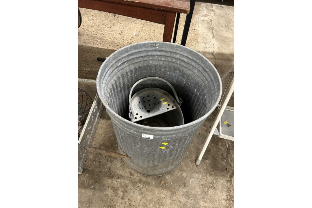 A galvanised bin together with a galvanised mop bucket