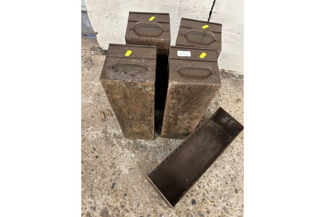 Five brown metal cartridge/ammo tins