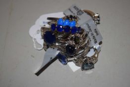 Ten silver and gemset rings: to include an oval sapphire and white stone ring, a star sapphire