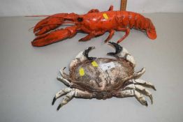 A moulded plastic model lobster and accompanying crab (2)