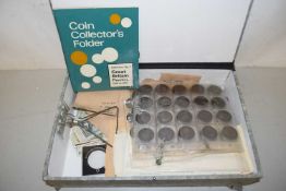 A case of mainly British coinage plus some world editions and Whitbread and other cards