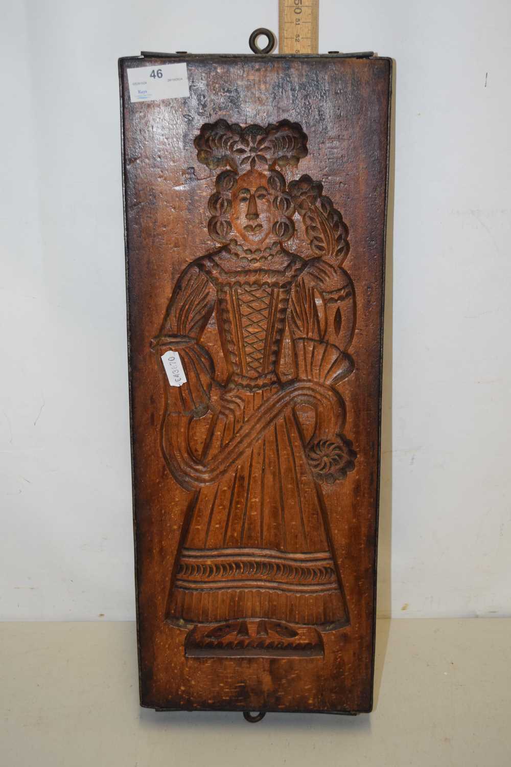 An iron mounted hardwood figural press (double sided)
