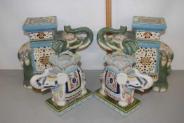 Two pairs of elephant formed jardiniere stands