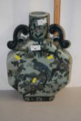 A 20th Century Chinese porcelain moon flask with bird amongst branches design, 40cm high
