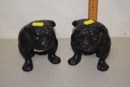 Pair of black finish porcelain bulldogs